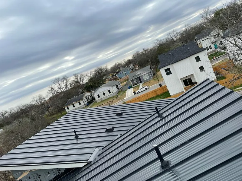 Standing seam metal roof panels with vents for Skylight Repair in Van Wert